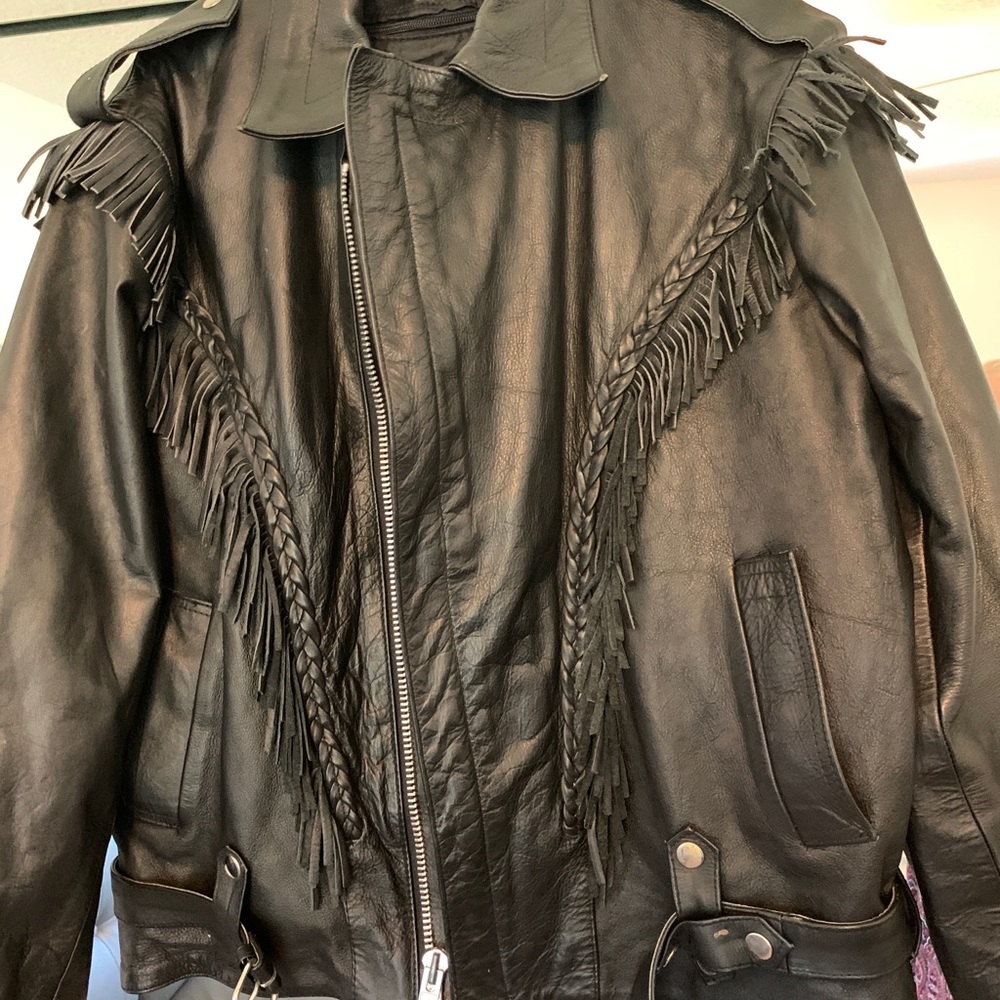 Women’s black leather fringed motorcycle jacket